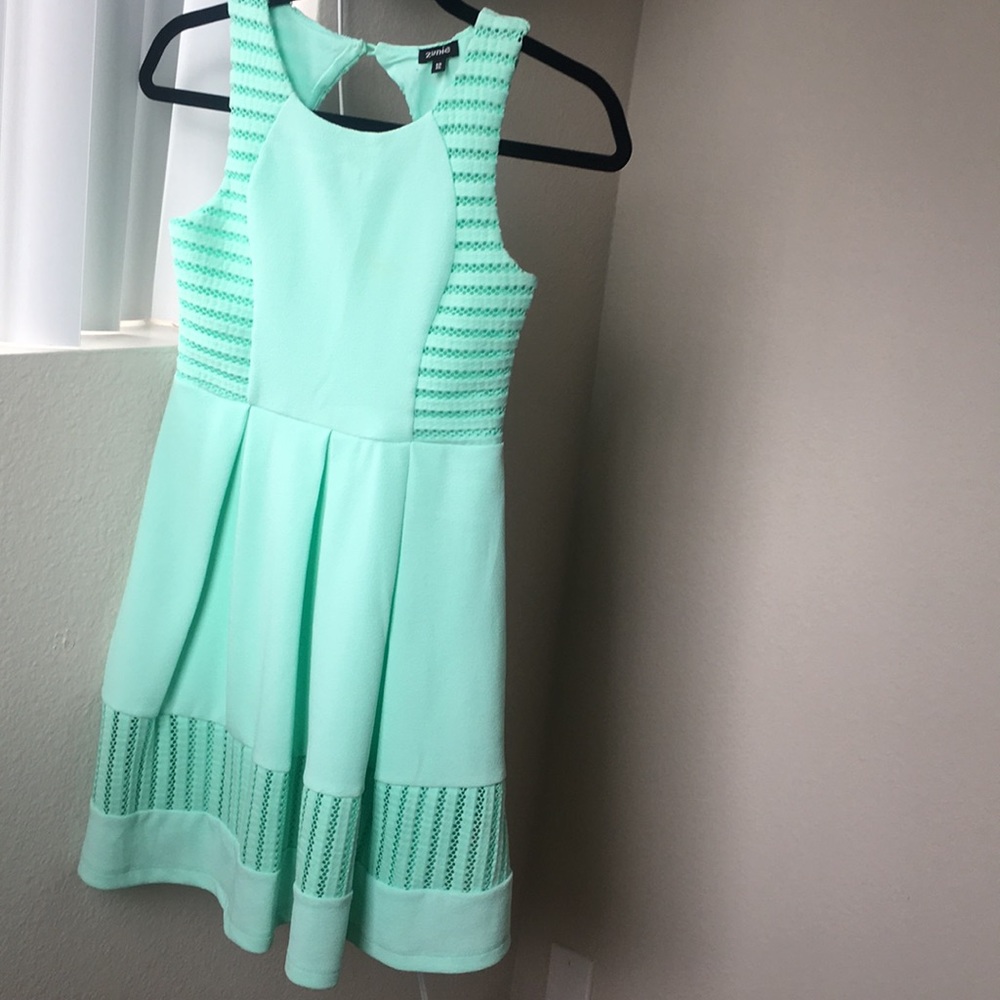 Minty green dress.